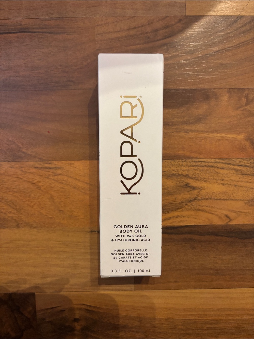 Kopari Golden Aura Body Oil – White & Gold Packaging